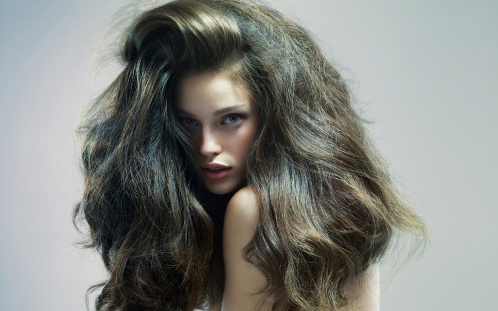 Many girls dream of healthy, lush and bulky hair. Using sophisticated methods will help to give extra volume to your hair and make it more expansive. There are a few secrets that will allow you to forget about your dull hair and learn how to make fluffy and voluminous hair.

Taking care of your hair to increase volume

Generally, when trying to style their hair on a daily basis, women use hot dry hair and use harsh styling products. But lush hairstyles will only last for a few hours if you don't take care of your health.

So before you start organizing and picking up makeup, you have to give your hair care a fair shake. Constant styling, flattening and irons only worsen the poor condition of hair that has no volume.
Proper grooming with high quality cosmetics;
Natural homemade masks;
Appropriate styling;
Hairstyles that visually enhance the beauty of your hair.

There are also many homemade masks that make hair thick and smooth. Recipes and rinse masks will quickly show you how to make thin hair look voluminous. Often the haircut loses its volume due to a lack of beneficial nutrients.

Therefore, it is recommended to eat and enrich your body with vitamins. To avoid damaging your weakened hair, you should use less cosmetic products and not blow-dry it. It is better to either dry your hair without a blow dryer or use low temperatures.

Masks for luxurious volume

A great way to strengthen your hair at home is to make a special mask. Today you can find many interesting masks, depending on the ingredients used.

For example, you can create a mask from eggs, cocoa and kefir. All three ingredients should be mixed and applied to the roots and soak for half an hour. The natural mask is very easy to rinse out with regular shampoo. If you constantly follow this procedure, your hair will become thick, shiny and bulky.

Another way to get healthy hair is to apply colorless henna. This substance wraps the hair and gives it shine and volume. In addition, colorless henna restores dull and damaged hair.

How to make my hair lush after washing it?

After washing your hair, you can't towel it off too much, because it will damage the sensitive structure. Gently wrap a towel around them and wait about ten minutes to remove the moisture. To get the volume, you should dry your head by leaning forward.

Hair care and grooming

Use special accessories to increase the volume of your hair. You need to have a good hair dryer, the capacity of which will allow you to style with appropriate volume. If the set contains different attachments with a dryer, this will provide more opportunities to create different styles of hair independently. You need a round brush among the combs. A flat comb is also useful because it allows you to lean your hair towards shine.

For very short hair, it is better to choose wax or gel. Long hair will be comfortable with a foam or foam dryer. Each length requires a polish. In some cases, you can use other tools: curlers, hair clips and other tools.

How to make lush and voluminous hair while styling?

The main method of increasing the volume of hair is the right work. It does not require much time or special skills to liven up your hair and make it lush. You should shampoo your hair, blot it with a towel and dry it with a round brush. It is better to start drying from the neck and ends of the hair, and then lift from the roots. It is advisable to divide the hair into several large strips to alternately go through the hair dryer with a brush on the entire head.

How to make hair voluminous at the roots

To visibly lift the hair at the roots, you must do a comb-over. First you have to wash your hair and style it. Then the hair is separated into top and bottom.Now you can just leave the bottom curls next to the roots and spray them with hairspray. The frizz will be hidden under the top layer of hair, which remains smooth and thoroughly combed, making the hairstyle aesthetically pleasing.

Lushness on short hair

Various styling options can be used on short hair lengths. Some people prefer to lift only part of their hair, such as when combing a bob.

Owners of short haircuts can experiment with different styling methods. With too short hair, you can't do frizzes, but you can blow-dry it back to the roots to make the hairstyle appear frizzy.

How to make volume on medium hair

In order for medium hair to get a lush hairstyle, you need to blow dry your head as usual. For the fan of simple and lush hair, you can make some curls, lifting them only close to the roots. But beautiful waves just add volume and look more natural.

How to do a voluminous style on long hair

It is long hair that has the greatest number of different tabs and hairstyles that increase volume. Using universal tips for a volumizing system, it is easy to detangle long hair.

It is better to choose large diameter rollers to get sweet and natural curls. You will have to wash and dry your hair a bit, then take your favorite foam and curl the curlers. You can top dry your hair with a hair dryer or leave the curlers in overnight. The finished curls are secured with a blow dryer.

The hair can be styled or folded, making the hairstyle more lush. For example, you can wrap the braid and loosen the curls a little to visually create the impression of very lush hairstyles.

To choose a hair styling method, you need to consider the length of your hair and the amount of time you have available. Some of the hard ways it can take all night, such as if you roll your hair in curlers or braids. But many of the tips should be used all the time in everyday life when hair care is done.

Deprived hair volume is a huge problem for the wearer. Even if curls are lush and thick by nature, they eventually become thin, losing their luxurious look. It is especially difficult to give volume to fine hair . For a great type of hair, it is recommended to take care of curls, regular performance of special masks and regular styling belts.

How to increase hair volume

If you believe the statistics, this is a headache for 90% of all girls in the world. Professional stylists and makeup artists are convinced that there is a solution to this problem. To increase lushness, you need to spend a little more effort on your curls than ever before: use a good comb, hair care products, curling irons, blow dryers.

How to create volume on your head:
Use special shampoos to give volume to thin and weak curls. Compositions that contain silicone surround each hair and give the hair a glow, silky, lushness. Professional shampoos with protein and keratin nourish curls from the inside out, strengthening, shaping, flexible and supple.
Stack for lathers, foams, and gels. To create basic hair volume, the tool is applied to the entire length after you wash your hair.
Do the right hairstyle. For girls with bad hair, it is not recommended to disturb them. In this case, stylists advise to make a bob or a longitudinal cascade.
Some women prefer not to suffer, but to grow. Thus, you can increase the volume of hair for at least six months.
Get a beauty makeover in a beauty salon (haircut, coloring). Playing with shades of color will make your hair visually lush.
